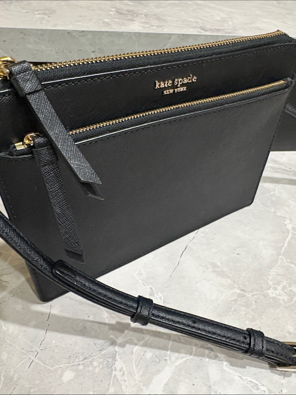 kate spade black saffiano leather messenger crossbody with gold hardware